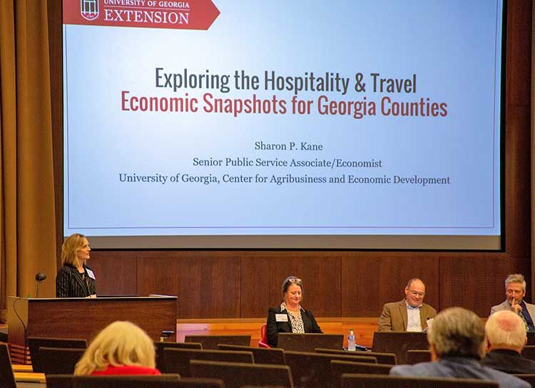 UGA agribusiness and community development economist Sharon Kane unveils improved and updated hospitality and tourism data at the 2023 HOST Hospitality and Tourism Summit at UGA in May.