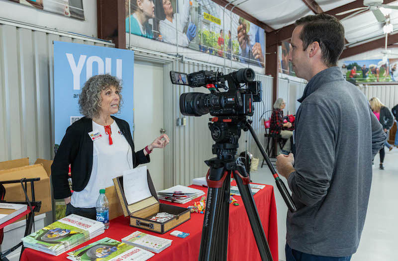 Anna Scheyett is recorded at her UGA Extension booth at the Sunbelt Ag Expo in Moultrie, Georgia