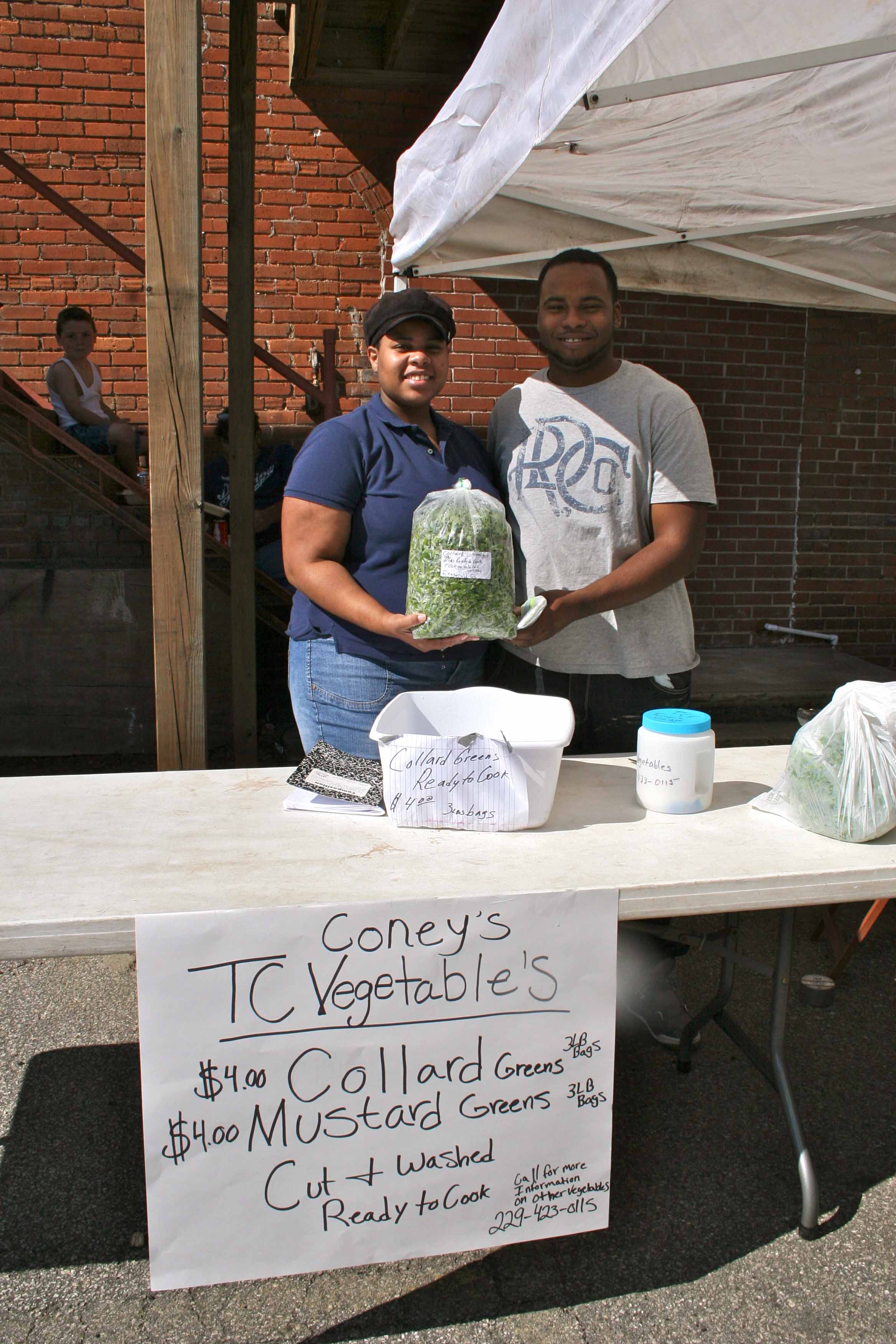Tempest Coney and Randall Richardson of TC Coney Vegetables at the downtown farmers market in Tifton, Ga.