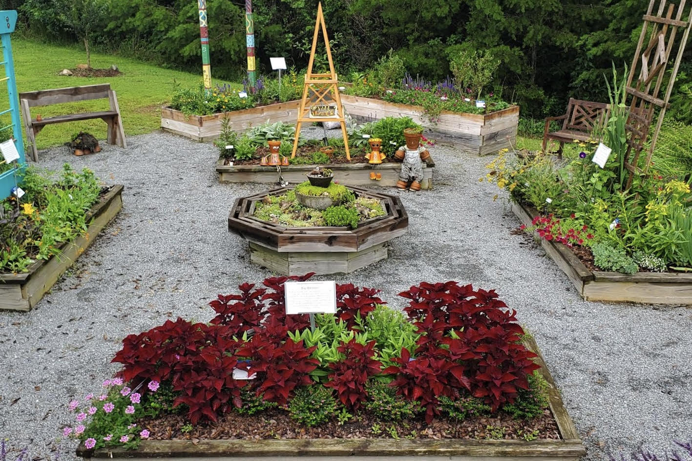 Colorful raised beds and stone pathways comprise a Georgia Master Gardener demonstration garden