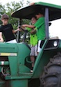 A new University of Georgia program, AgTeen, relies on farming fathers to teach their children farm safety rules.